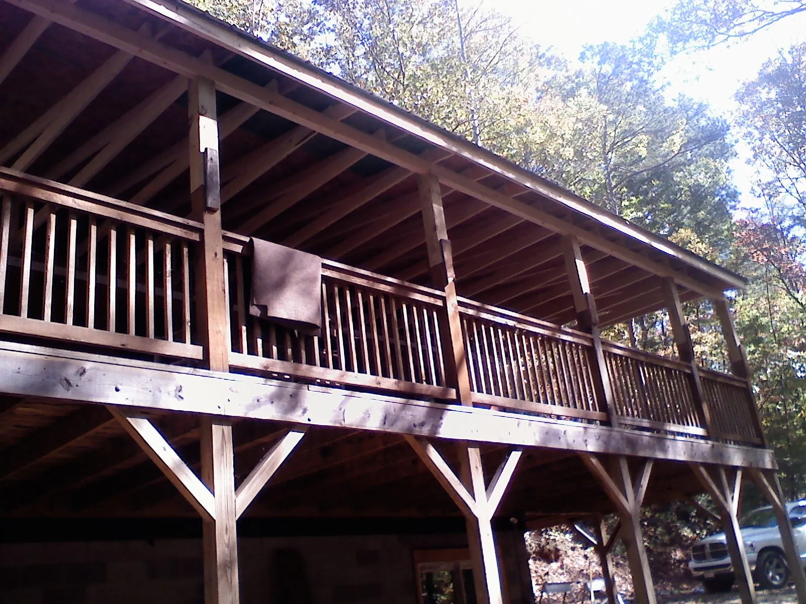 Timber framing under a new elevated porch and deck — Roof Leak Repair in Maple Grove by Roofing Brothers